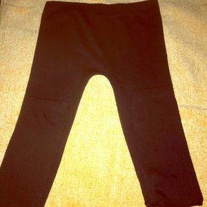 Black cord striped stretch pants.